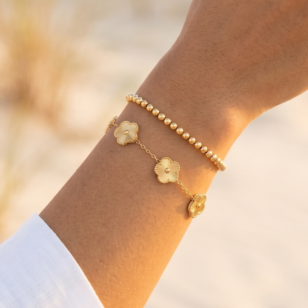 The clover flower bracelet worn on the wrist