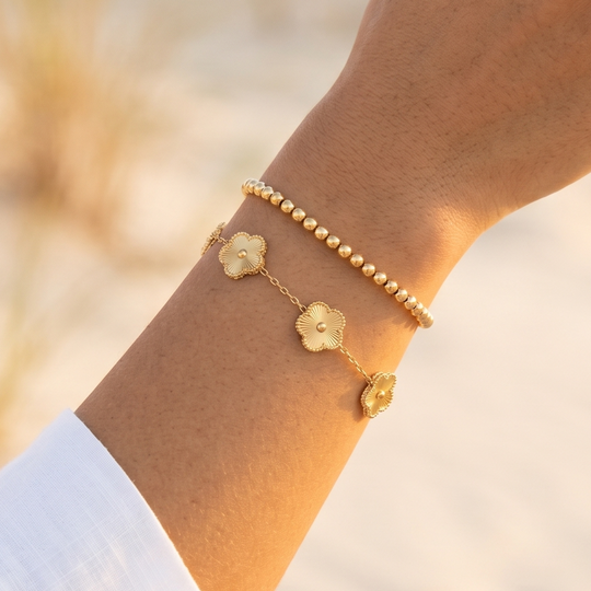 The clover flower bracelet worn on the wrist