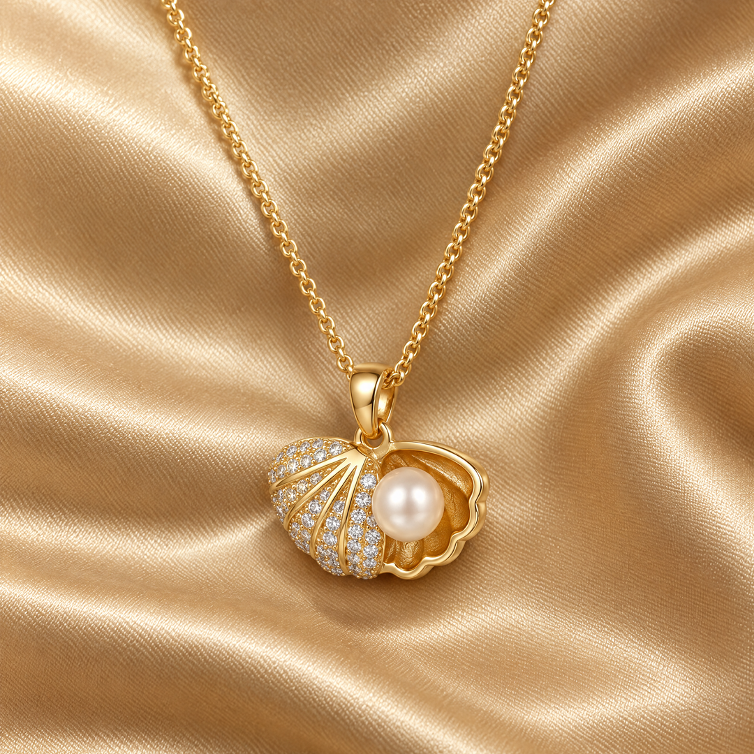 The Cleo Shell Pendant resting on champagne satin