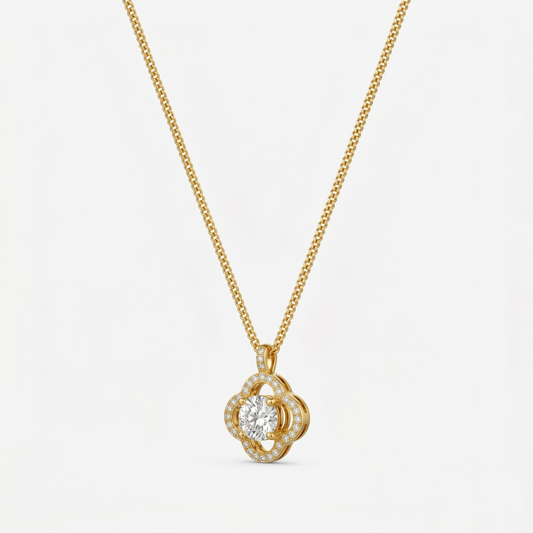 A gold-tone pendant necklace with a five-petal cubic zirconia flower, on a plain background