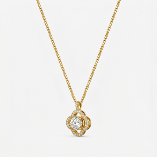 A gold-tone pendant necklace with a five-petal cubic zirconia flower, on a plain background