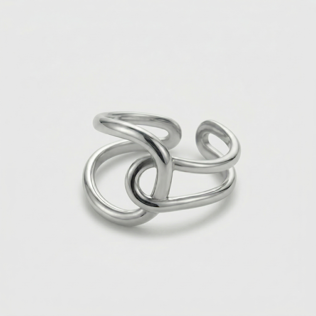 The crossing ring seen from the side, showing how the two bands loop