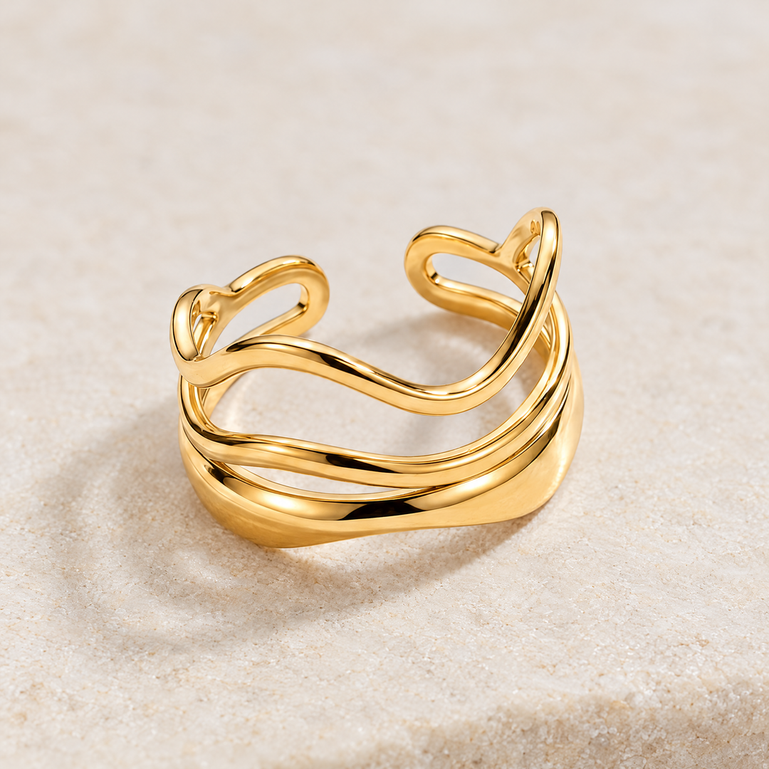 Close detail of the Marlo Flow Ring, showing the texture and the band