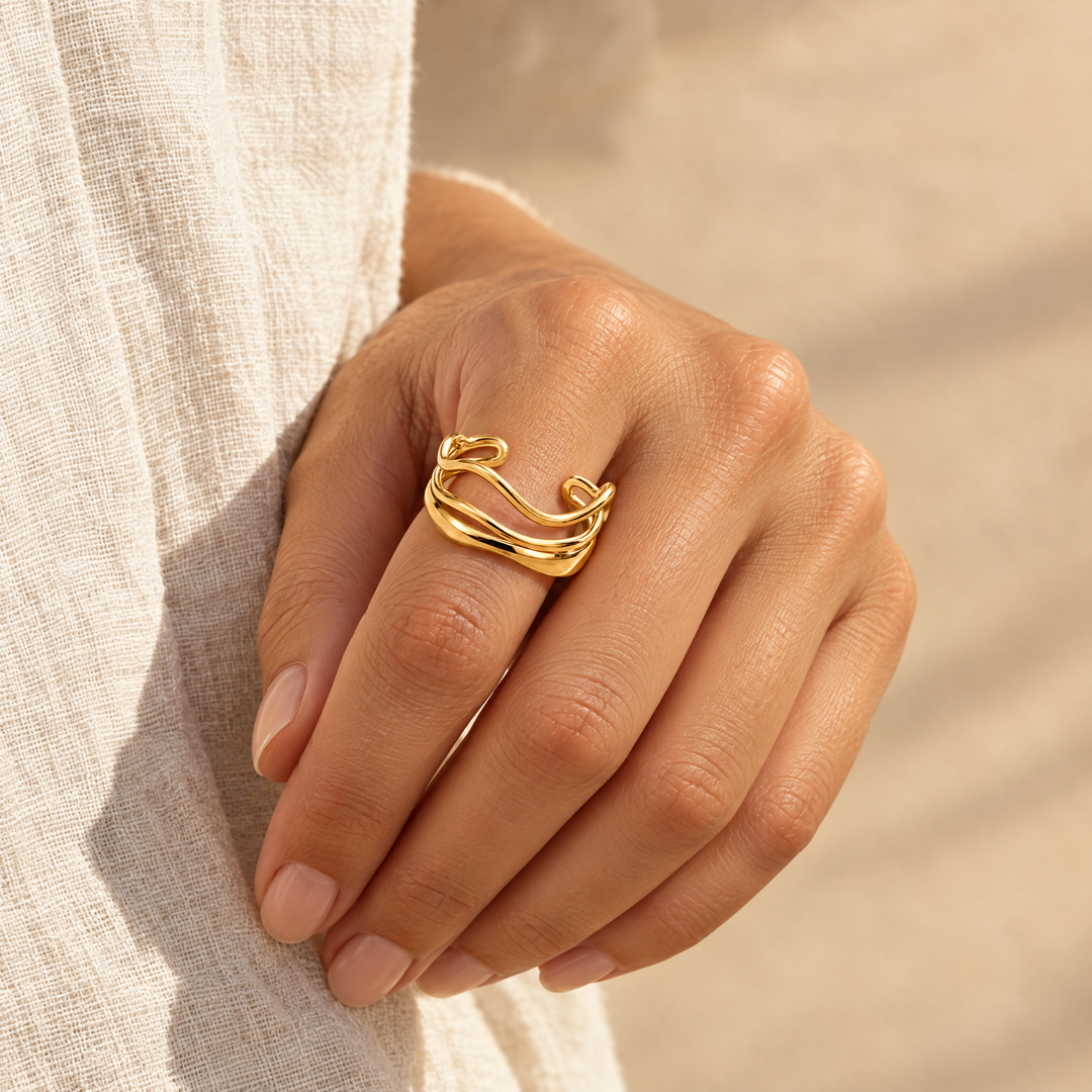 The Marlo Flow Ring worn, seen from the side in afternoon light