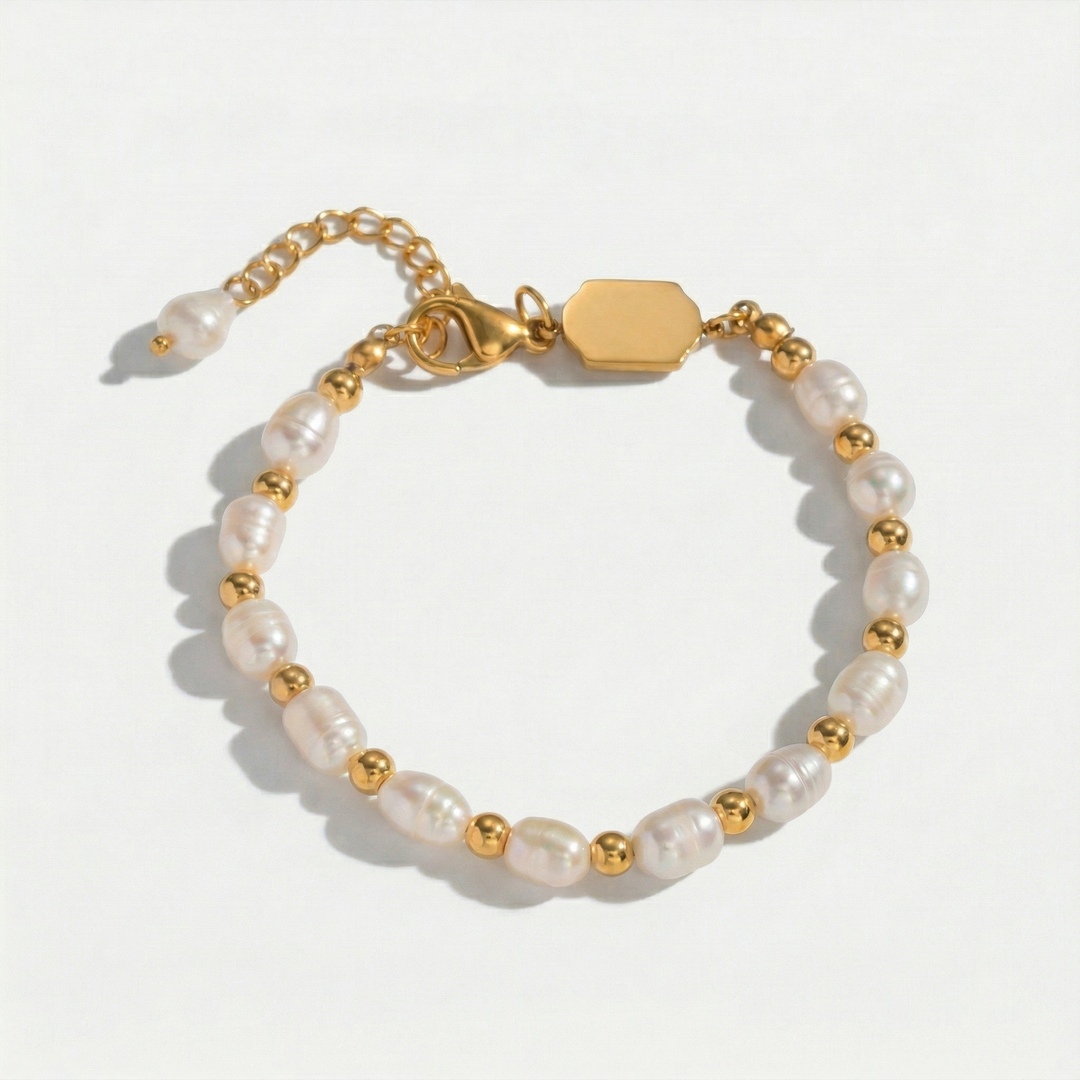 Close view of the pearls and beads on a plain background