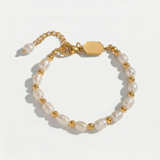Close view of the pearls and beads on a plain background