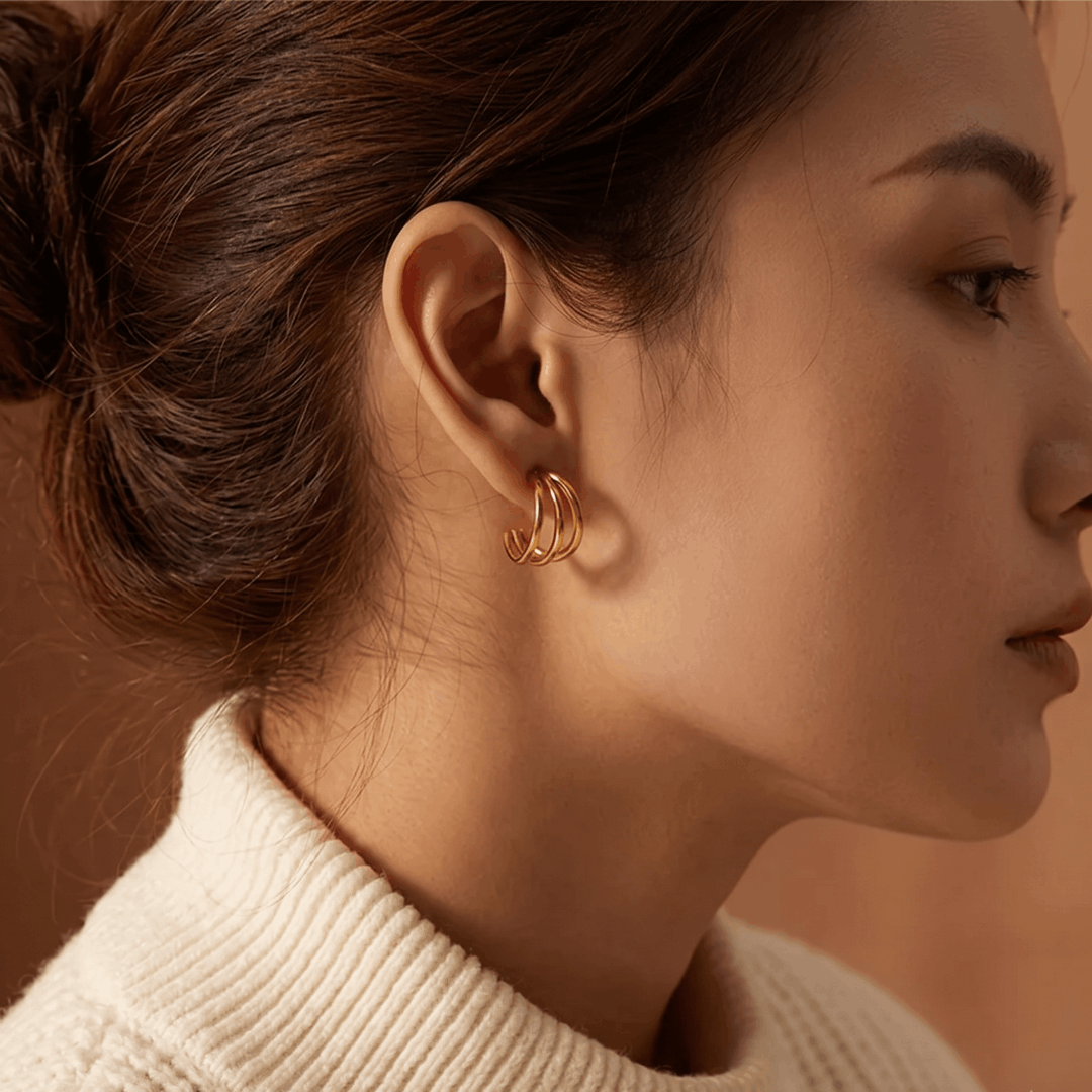 The triple hoop worn, seen in profile