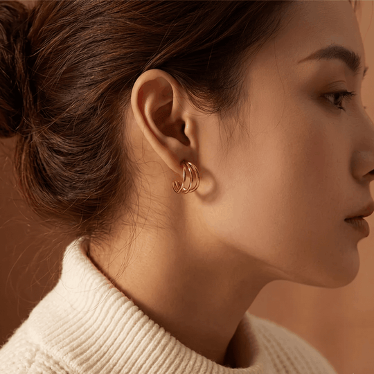 The triple hoop worn, seen in profile