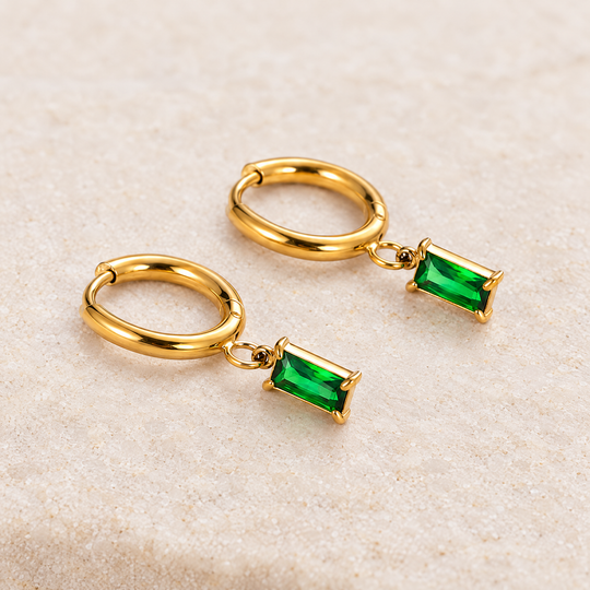 Close detail of the Ines Green Drop Hoops, showing the texture and the closure
