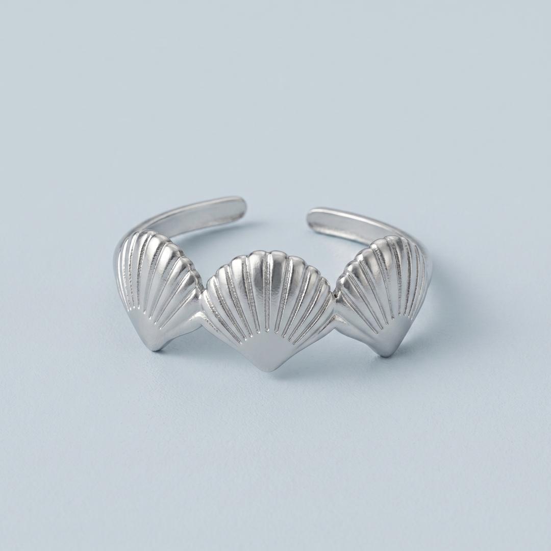 Close detail of the silver-tone scallop shell ring