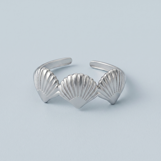 Close detail of the silver-tone scallop shell ring