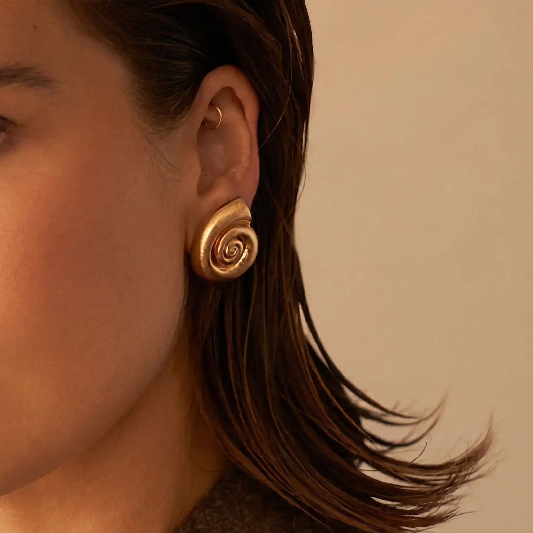 The shell stud worn, seen in profile