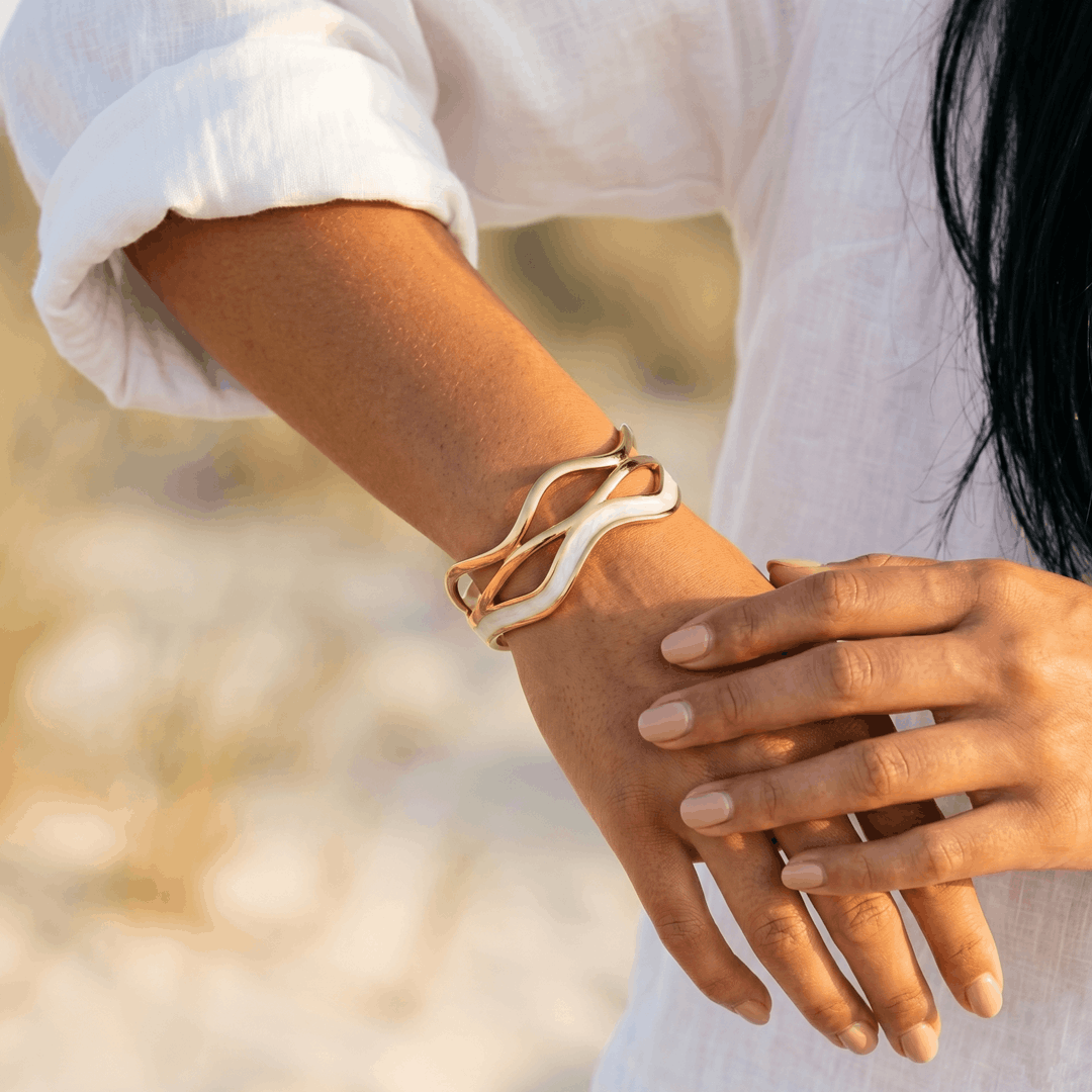 The wave cuff worn on the wrist